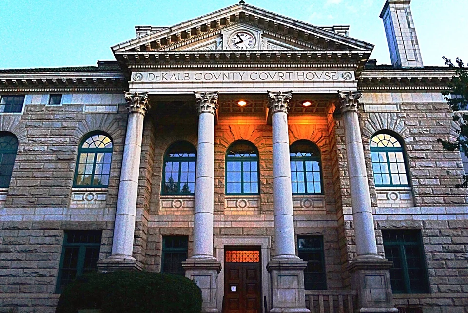 The columned entrance of the Historic DeKalb County Courthouse in Decatur
